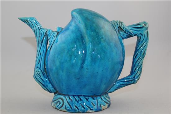 A Chinese turquoise glazed peach shaped cadogan type wine pot, 19th century, height 17.5cm